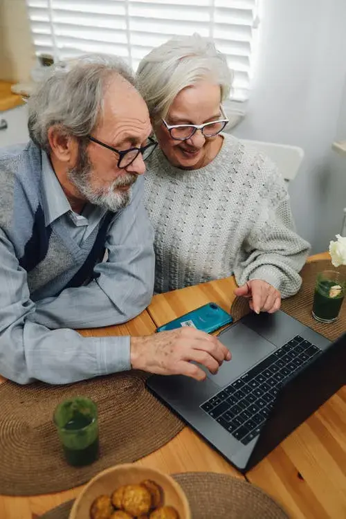 An elderly couple reviewing if they are eligible for Prescription Drug Plans.