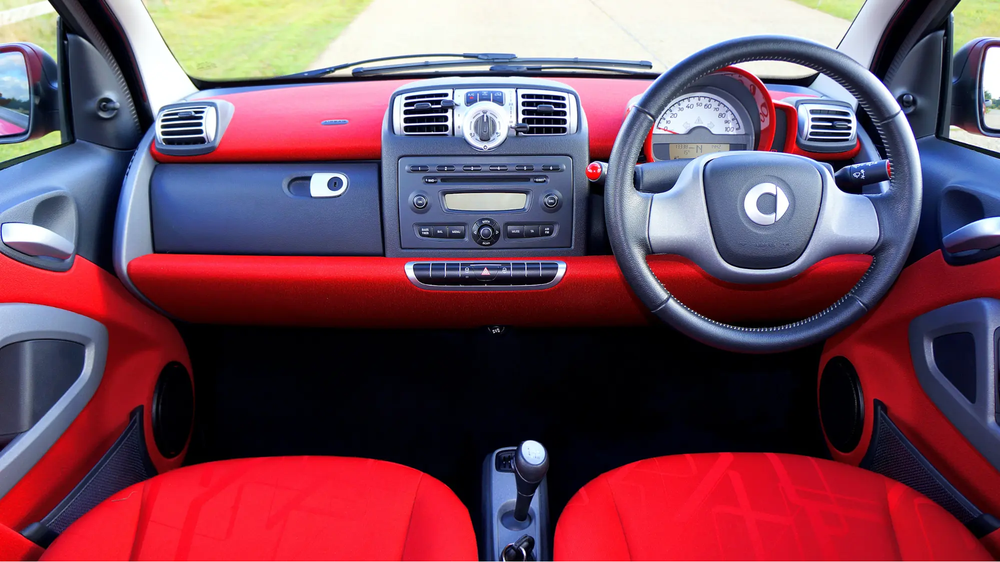 red car interior dashboard