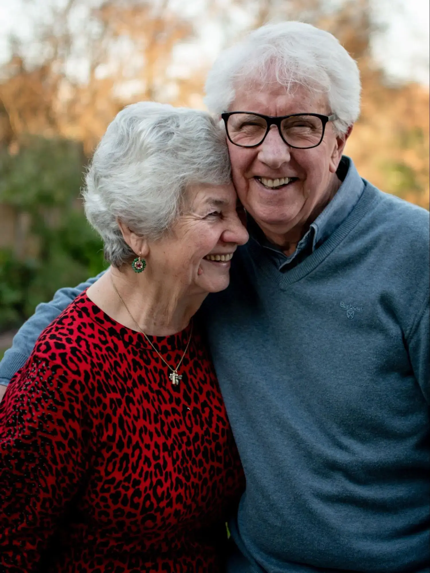 An elderly couple that are happy because they have a Medicare PFFS plan.
