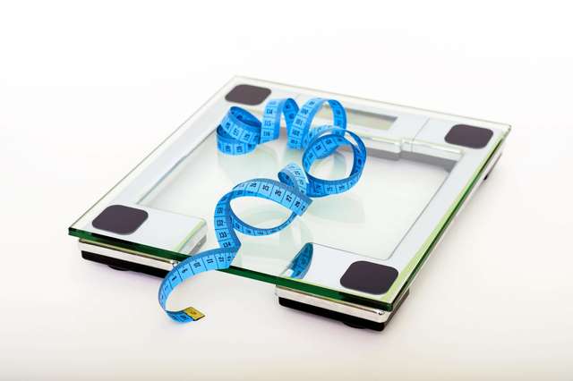 Source: https://www.pexels.com/photo/blue-tape-measuring-on-clear-glass-square-weighing-scale-53404/