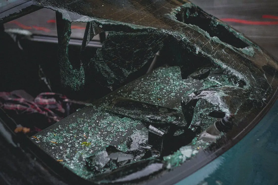 A windshield that has been damaged in an accident.