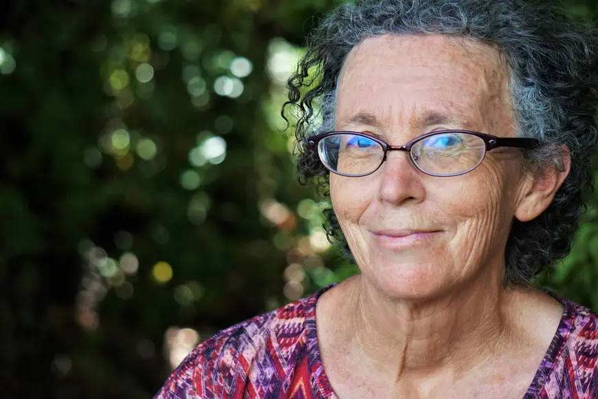 An older Florida woman who is happy because her Medicare Supplement Plan covers her expenses.