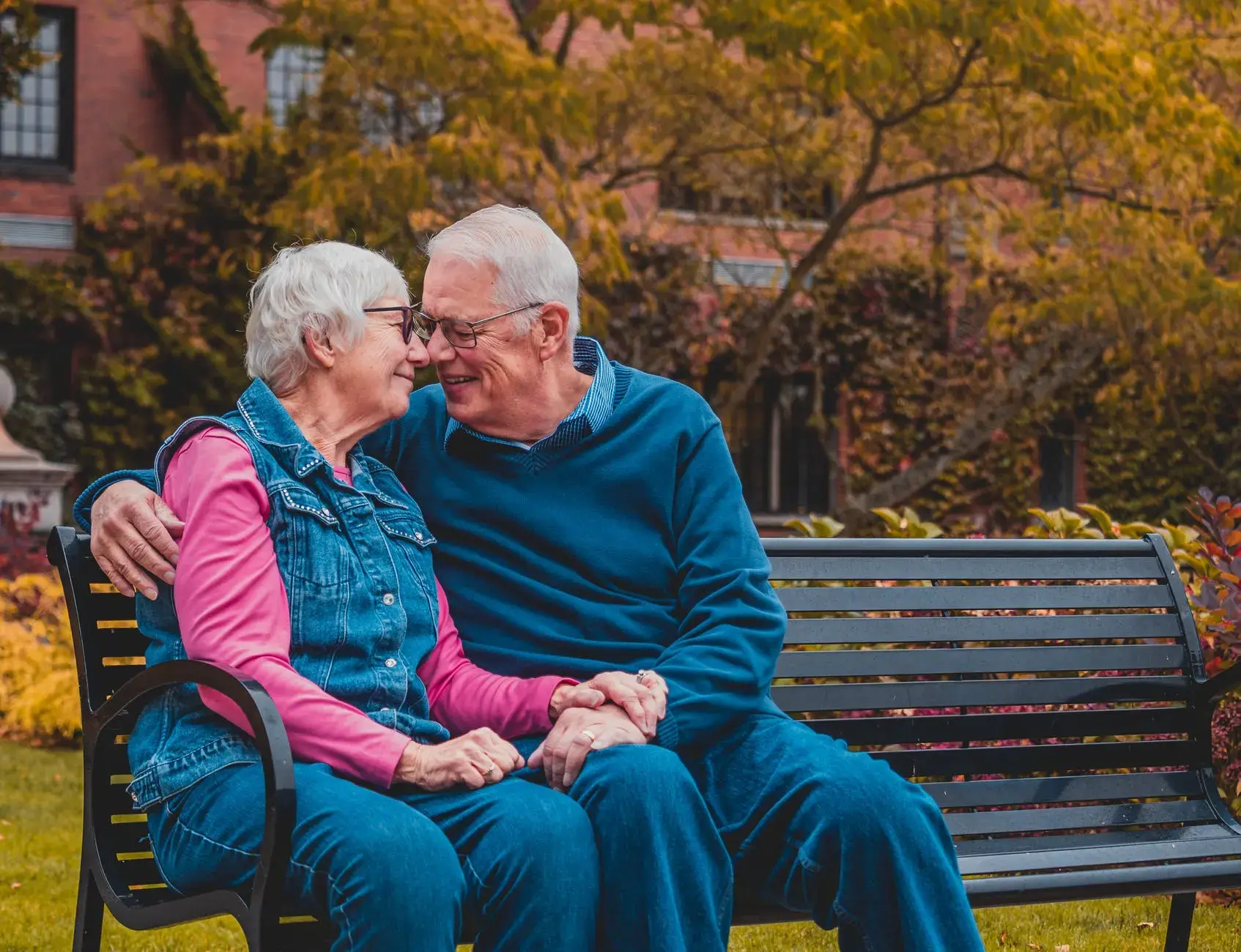 An elderly couple happy that they qualify for the Fall Open Enrollment Period.